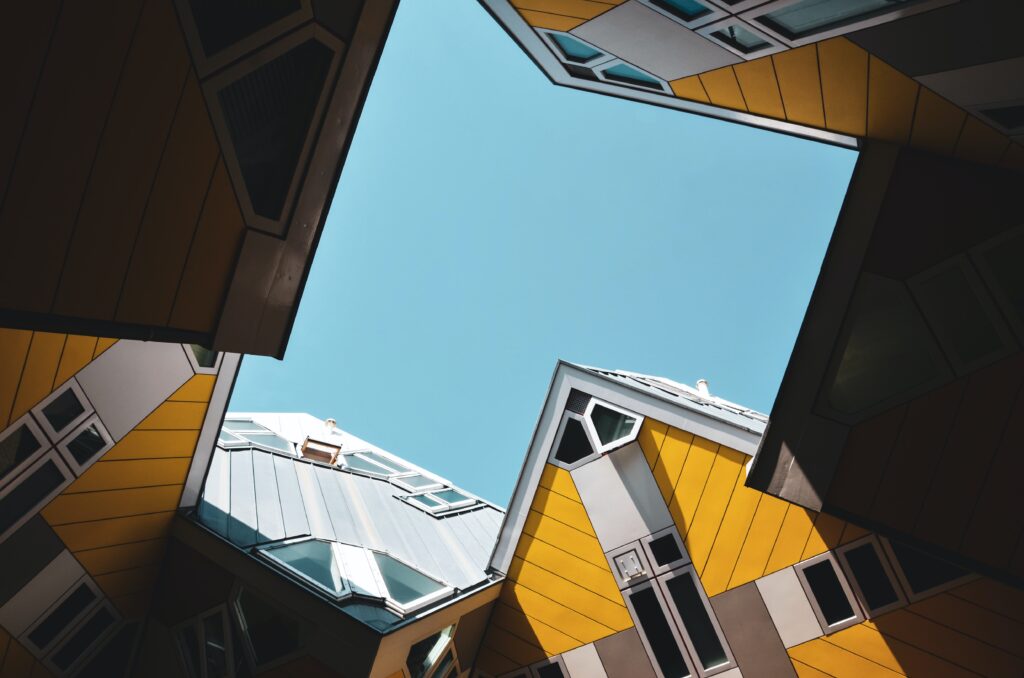 Calm Blue Sky Enhances Low-Angle Photography of Buildings